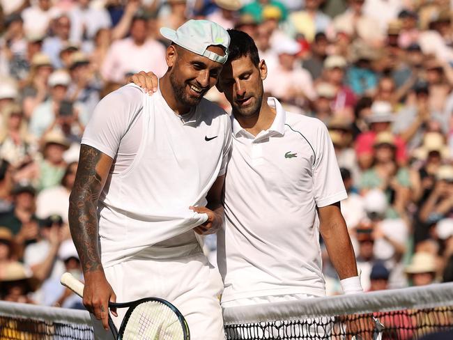 *2022 Pictures of the Year Australia* - LONDON, ENGLAND - JULY 10: Winner Novak Djokovic of Serbia (L) and runner up Nick Kyrgios of Australia interact by the net following their Men's Singles Final match day fourteen of The Championships Wimbledon 2022 at All England Lawn Tennis and Croquet Club on July 10, 2022 in London, England. (Photo by Ryan Pierse/Getty Images)