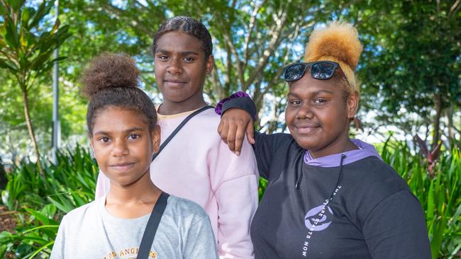 Rocksanne Gela (12) with MJ Miskin-Tabuar and Retimoi Gela from the Torres Strait enjoy the cooler weather along the Cairns Esplanade. Photo by Emily Barker