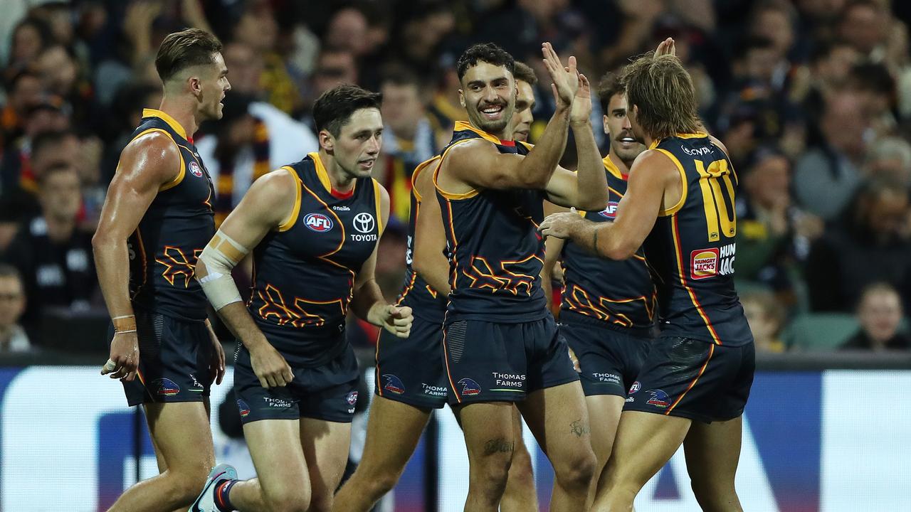 Izak Rankine of the Crows celebrates the first goal. Photo by Sarah Reed/AFL Photos via Getty Images.