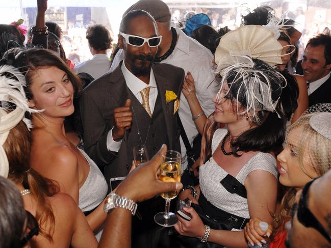 Snoop Dogg dances with girls in the Lavazza marquee in 2008.