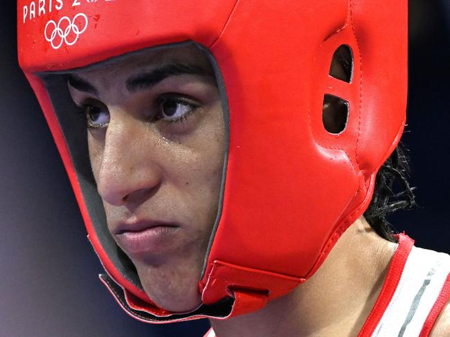 PARIS, FRANCE - AUGUST 1: Algeria's Imane Khelif (in red) during the Women's 66kg preliminary round match against Angela Carini of Italy (not seen) on day six of the Olympic Games Paris 2024 at North Paris Arena on August 01, 2024 in Paris, France. (Photo by Fabio Bozzani/Anadolu via Getty Images)