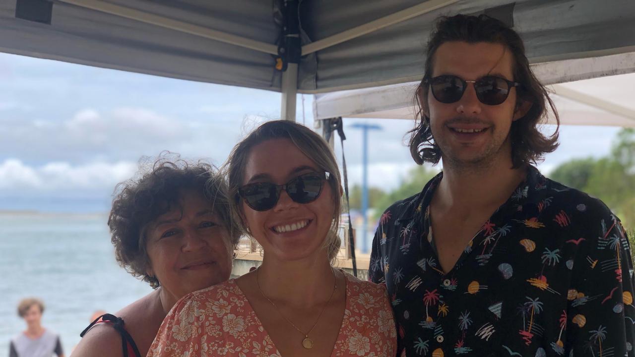 Lisa and Courtney Martin enjoy Christmas celebrations with Luke Chaplin at Cotton Tree Park. Picture: Laura Pettigrew.