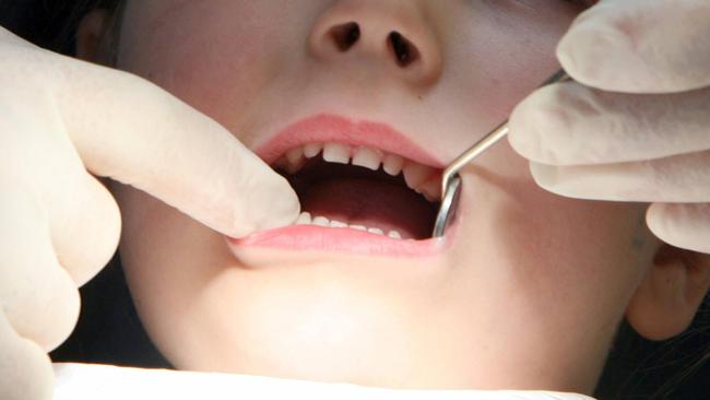 Queensland’s treatment of children with dental issues has been blasted.