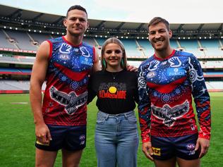 Melbourne Demons Steven May, far left, and Jack Viney, far right launch the Narrm Football Club along with Indigenous artist Ky-ya Nicholson Ward Ben Gibson / Melbourne Football Club