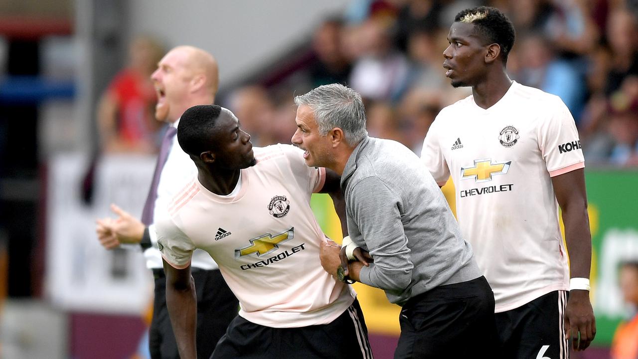 BURNLEY, ENGLAND — SEPTEMBER 02: Jose Mourinho, Manager of Manchester United in discussion with Eric Bailly of Manchester United as he replaces Paul Pogba of Manchester United during the Premier League match between Burnley FC and Manchester United at Turf Moor on September 2, 2018 in Burnley, United Kingdom. (Photo by Shaun Botterill/Getty Images)