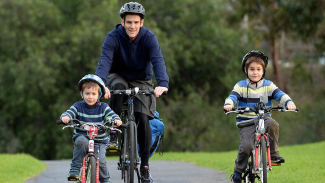 Clinton Kitt with Charlie, 4, and Angus, 8 are active cyclists but opposed to the shared path project going ahead at Rushall Reserve. Picture: David Smith