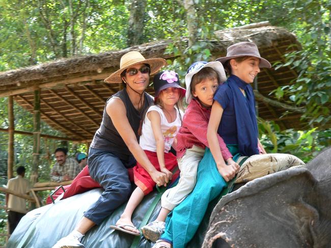 Ranjeny Thomas with her three children, twins Asha and Bryn, and Sylvie in India in 2006.