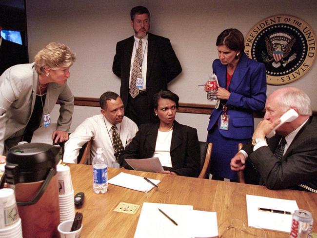 US Vice President Dick Cheney (R) speaks by phone to US President Bush from the operations centre at the White House following the terrorist attacks on New York &amp; Washington.