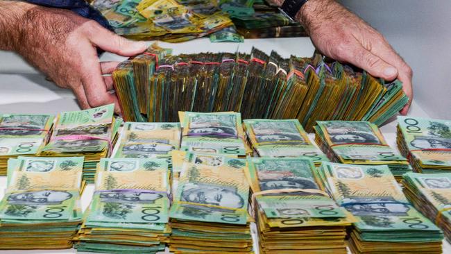 Part of the $1.8 million cash seized during Operation Ironside South Australian arrests. Picture: NCA NewsWire / Brenton Edwards