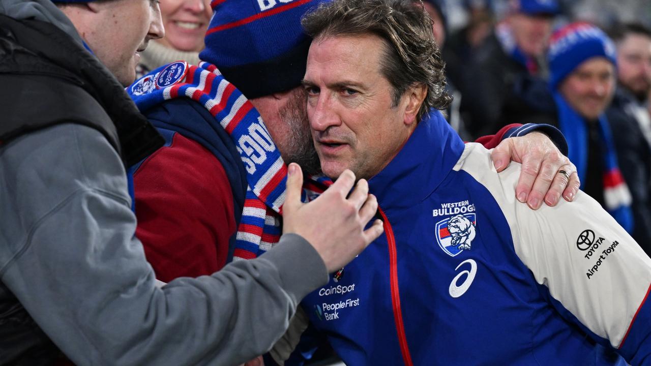 GEELONG, AUSTRALIA - JULY 20: Luke Beveridge, Senior Coach of the Bulldogs greets a fan after the round 19 AFL match between Geelong Cats and Western Bulldogs at GMHBA Stadium, on July 20, 2024, in Geelong, Australia. (Photo by Daniel Pockett/Getty Images)