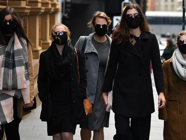 A group of women, described as James Davis partners, leave the Supreme Court in Sydney on Wednesday. Picture: NCA NewsWire/Joel Carrett