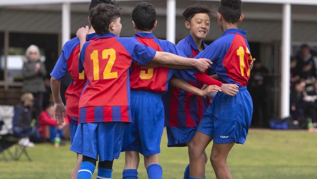 Torrens River players celebrate a win against Onkaparinga North in the Year 7 Boys Metro Sapsasa Soccer competition. Picture: Emma Brasier