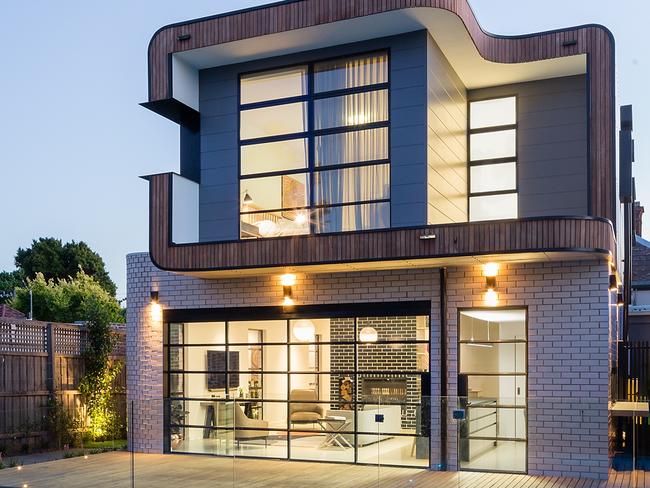 The house the kids helped renovate by Jost Architects. Photographer: Armelle Habib and Greg Elms