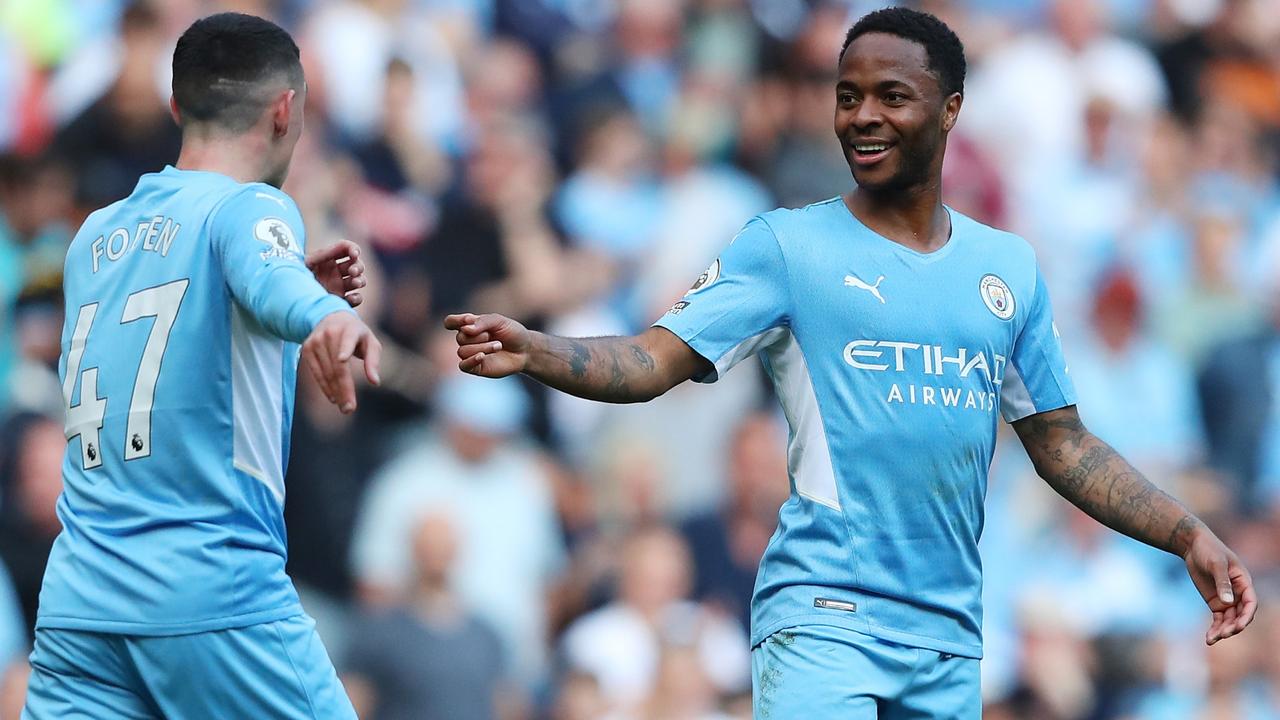 MANCHESTER, ENGLAND - MAY 08: Raheem Sterling of Manchester City celebrates scoring their side's fifth goal with teammate Phil Foden during the Premier League match between Manchester City and Newcastle United at Etihad Stadium on May 08, 2022 in Manchester, England. (Photo by Alex Livesey/Getty Images)