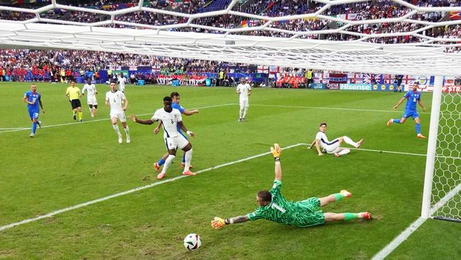 David Strelec of Slovakia shoots past Jordan Pickford. Picture: Getty Images