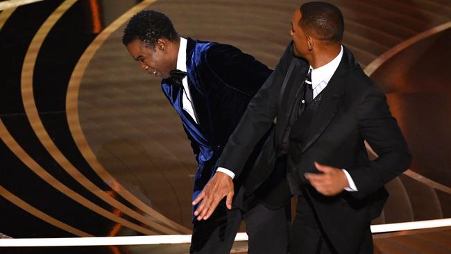 Will Smith (R) slaps US actor Chris Rock onstage during the 94th Oscars at the Dolby Theatre in Hollywood, California. Picture: AFP