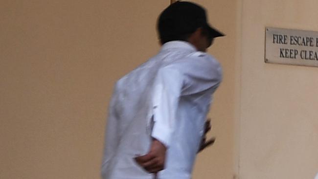 Mohammad Qadir runs from Darwin Supreme Court during his trial