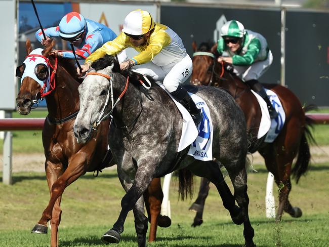 NEWCASTLE, AUSTRALIA - NOVEMBER 16: Tyler Schiller riding Briasa win Race 8 The Newcastle Herald Hunter during The Hunter Race Day at Newcastle Racecourse on November 16, 2024 in Newcastle, Australia. (Photo by Jeremy Ng/Getty Images)