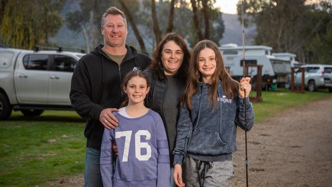 Stuart and Belinda and Addison, 10 and Olivia, 12, at Halls Gap Lakeside Tourist Park. Picture: Jason Edwards