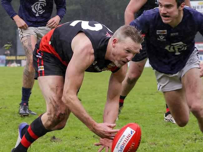 Nathan Buckley makes his return to footy as part of the Carlton Draft on Sunday for Nilma Darnum who play against Catani  in the Ellinbank and District Football League in Gippsland. The moment Buckley pulls his hamstring ten minutes into the first quarter with him leaving the field shortly afterwards. Picture: Ian Currie