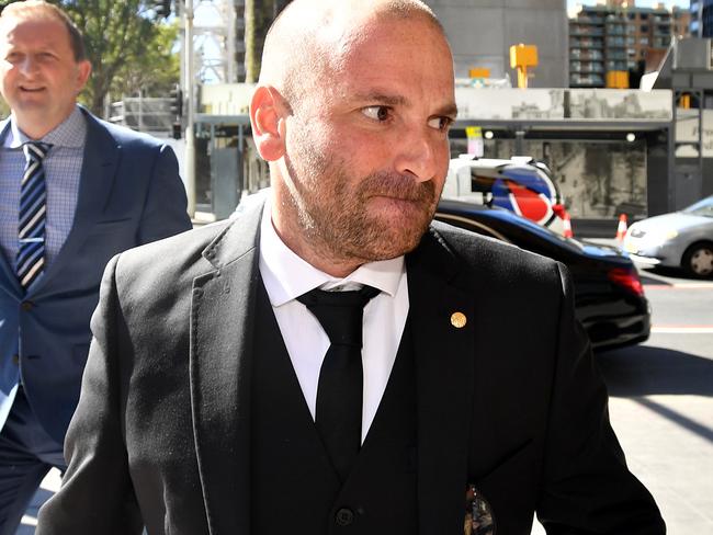 MasterChef judge George Calombaris arrives at the Downing Centre court today. Picture: AAP Image/Joel Carrett