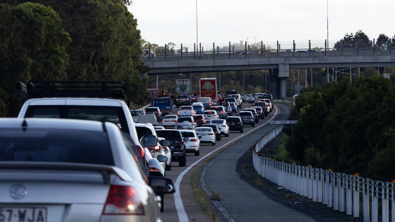 Heavy long weekend traffic heading south on the M1 Pacific Motorway towards the Gold Coast from Brisbane. Picture: Nigel Hallett