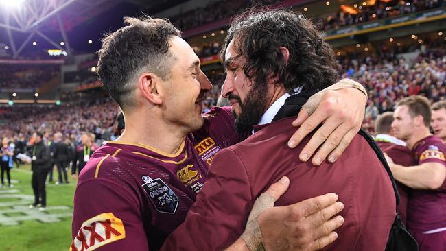 Johnathan Thurston (right) and Billy Slater after a Queensland series win. Picture: AAP