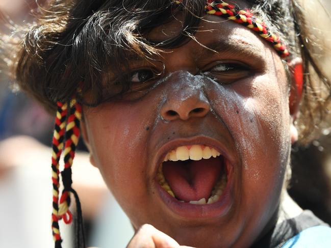 Invasion Day protesters are seen during Australia Day celebrations in Melbourne. Picture: AAP