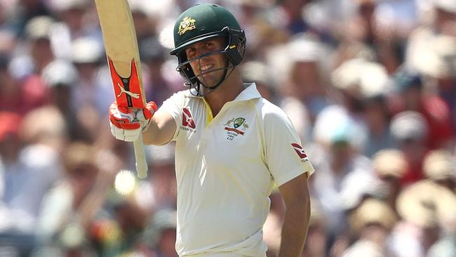 Mitch Marsh salutes the crowd after his half-century.