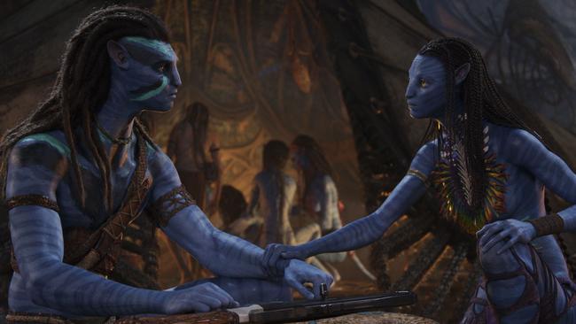 Sam Worthington as Jake Sully and Neytiri in Avatar: The Way Of Water. Picture: 20th Century Studios.