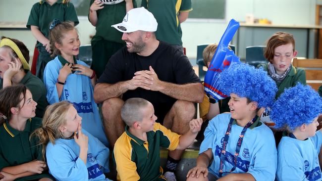 James Tedesco talks with the kids from Willawarrin Public School. Picture: Nathan Edwards