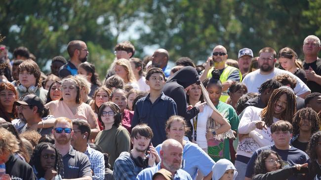 Students wait to be picked up by their parents after a shooting at Apalachee High School. Picture: Getty Images via AFP