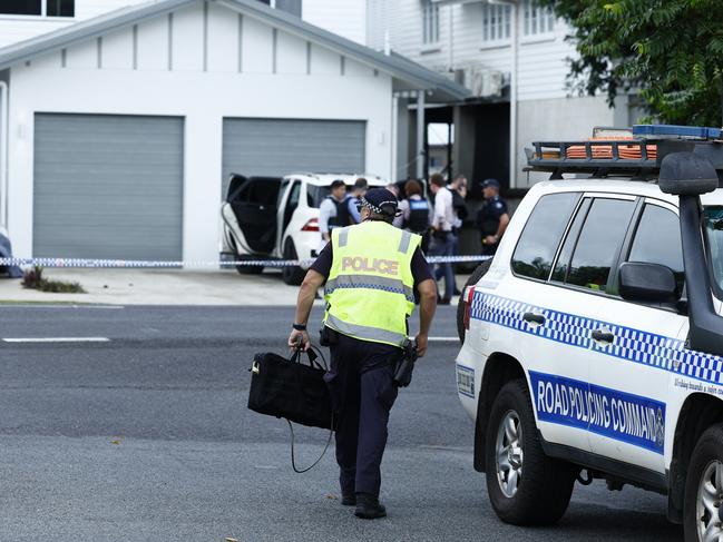 Police officers respond to reports of a shooting on Collins Avenue, Edge Hill, by setting up a 500 metre exclusion zone. Edge Hill State School, a nearby kindergarten and swim school placed into lockdown. A black Audi TT coupe involved in the initial incident was later found abandoned outside a Pease Street address. Picture: Brendan Radke