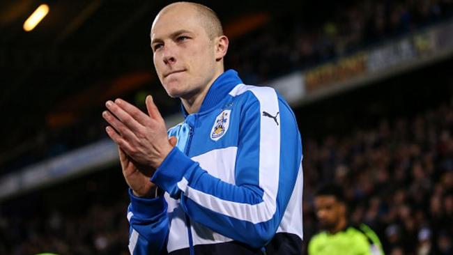 Aaron Mooy in action for Huddersfield.