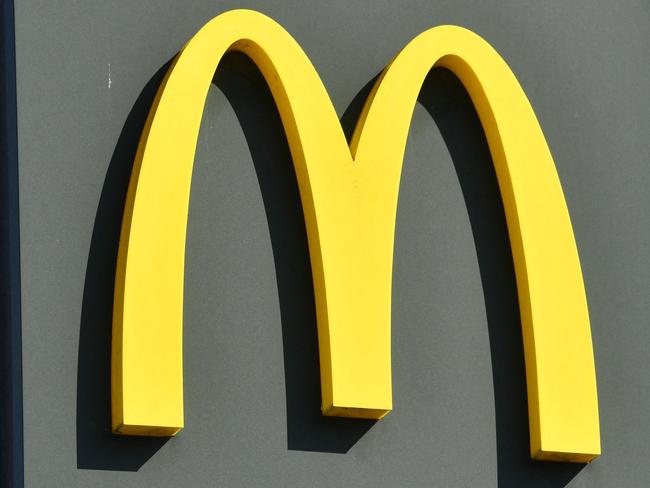 (FILES) This photograph taken on September 6, 2018, shows the logo of a McDonalds restaurant in Montpellier, southern France. A hearing in the case of a transgender woman accusing McDonald's of transphobia and harassment will take place at the Industrial tribunal (Conseil des Prud'hommes) in Angers, western France, on April 15, 2024. (Photo by PASCAL GUYOT / AFP)