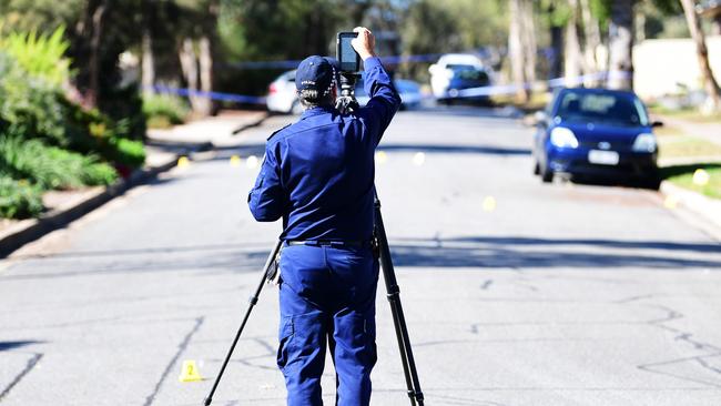 Police investigators take 3D imagery of the scene the day after the shooting. Picture: Mark Brake.