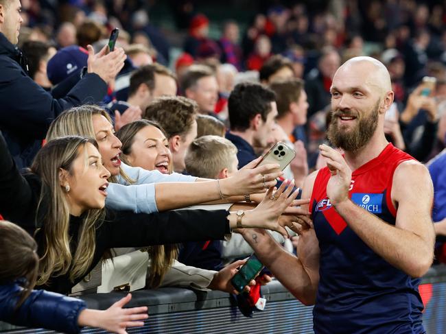 MELBOURNE, AUSTRALIA - MAY 04: Max Gawn of the Demons celebrates with fans during the 2024 AFL Round 08 match between the Melbourne Demons and the Geelong Cats at The Melbourne Cricket Ground on May 04, 2024 in Melbourne, Australia. (Photo by Dylan Burns/AFL Photos via Getty Images)