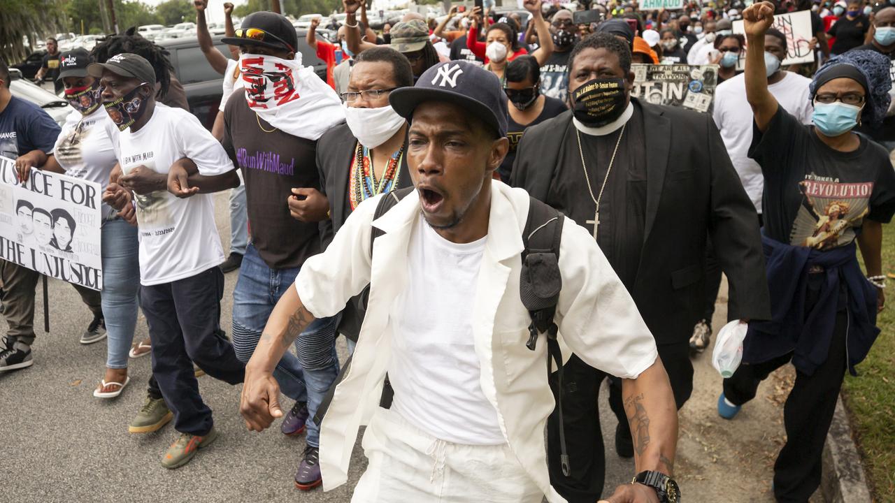Demonstrators protest the shooting of Mr Arbery. Picture: Stephen B. Morton/AP