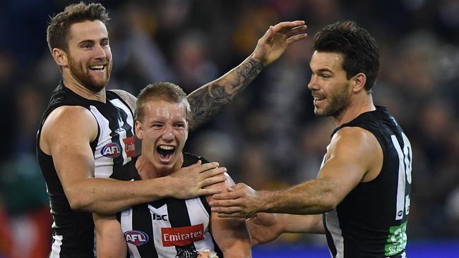 Josh Smith celebrates after kicking the winning goal for the Magpies. Picture: AAP Images