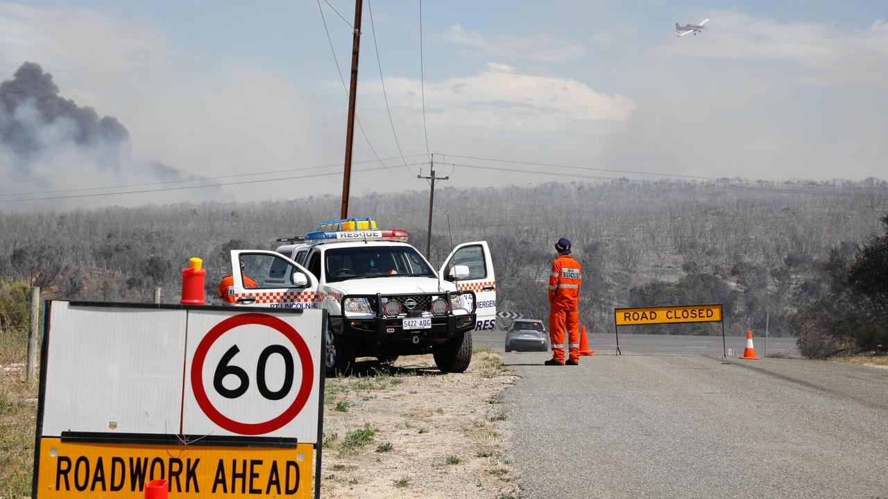 Multiple roads were closed as the fire tore through bushland. Picture: Robert Lang