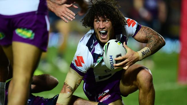 Kevin Proctor celebrates a try for the Storm.