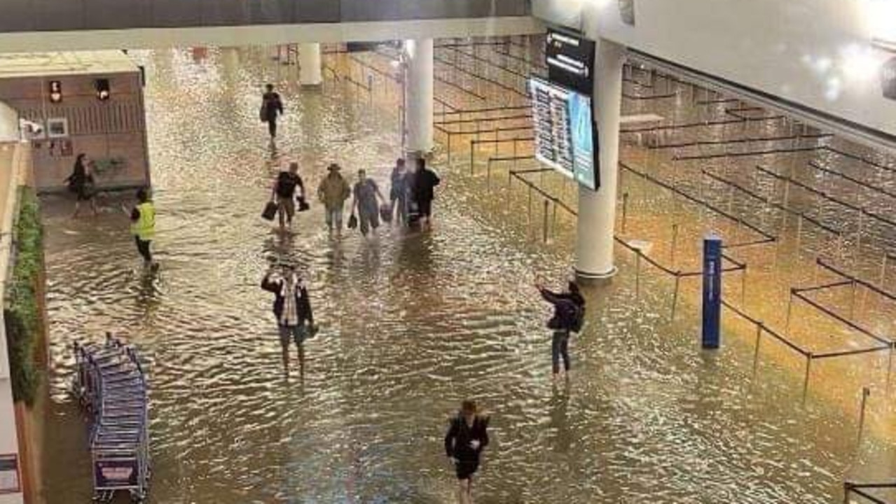 Passengers wade through Auckland Airport. Picture: Twitter