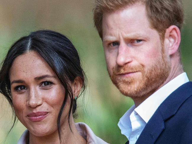 (FILES) In this file photo taken on October 02, 2019 Britain's Prince Harry, Duke of Sussex(R) and Meghan, the Duchess of Sussex(L) arrive at the British High Commissioner residency in Johannesburg. - A British newspaper group on Tuesday won a ruling to amend its defence against a high-profile claim by Meghan Markle for breach of privacy and copyright. The former television actress is suing Associated Newspapers over the publication of extracts of a letter she wrote to her estranged father before her wedding to Prince Harry in 2018. (Photo by Michele Spatari / AFP) / France OUT until 2019-10-17T00:00:00.000+02:00