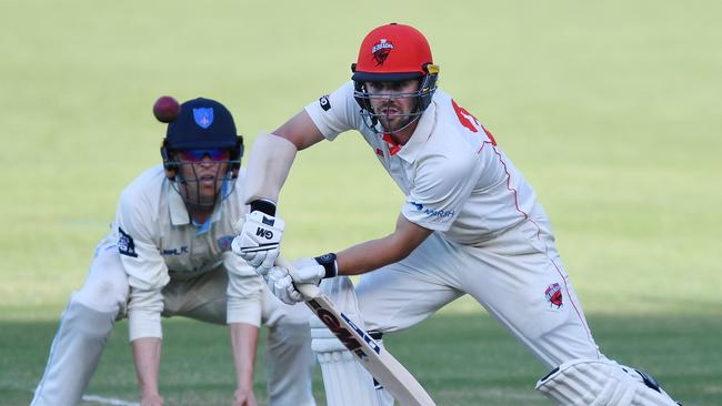 Travis Head of the Redbacks bats during the Sheffield Shield match against New South Wales at Adelaide Oval. Picture: AAP Image/David Mariuz