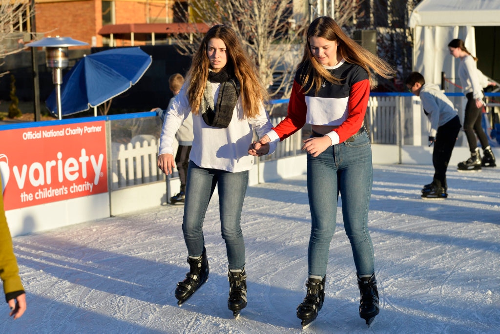 Having fun are Isabella Jacobsen (left) and Tia-Lee Golgerth ice skating at Winter Wonderland in the Civic Square, Friday, June 22, 2018. Picture: Kevin Farmer