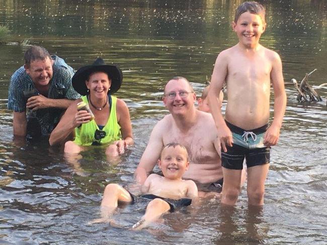 Time to cool off … Lee with partner Micky Stanley, brother Phil Hodgkin and her nephews.