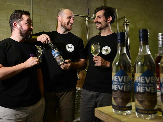 Never Never Distillery Co owners and founders Sean Baxter, Tim Boast and George Georgiadis at their West Thebarton distillery. Picture: Bianca De Marchi