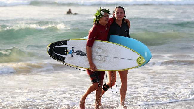 Surfers paddle out in memory of Alex 'Chumpy' Pullin on Saturday. (Photo by Chris Hyde/Getty Images)