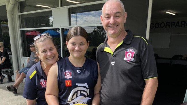 Emma Bracegirdle with her parents ahead of playing her 150th match for Coorparoo.