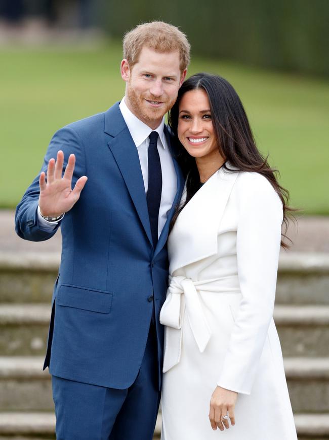 Prince Harry and Meghan Markle attend an official photocall to announce their engagement at The Sunken Gardens, Kensington Palace on November 27, 2017. Picture: Max Mumby/Indigo/Getty Images